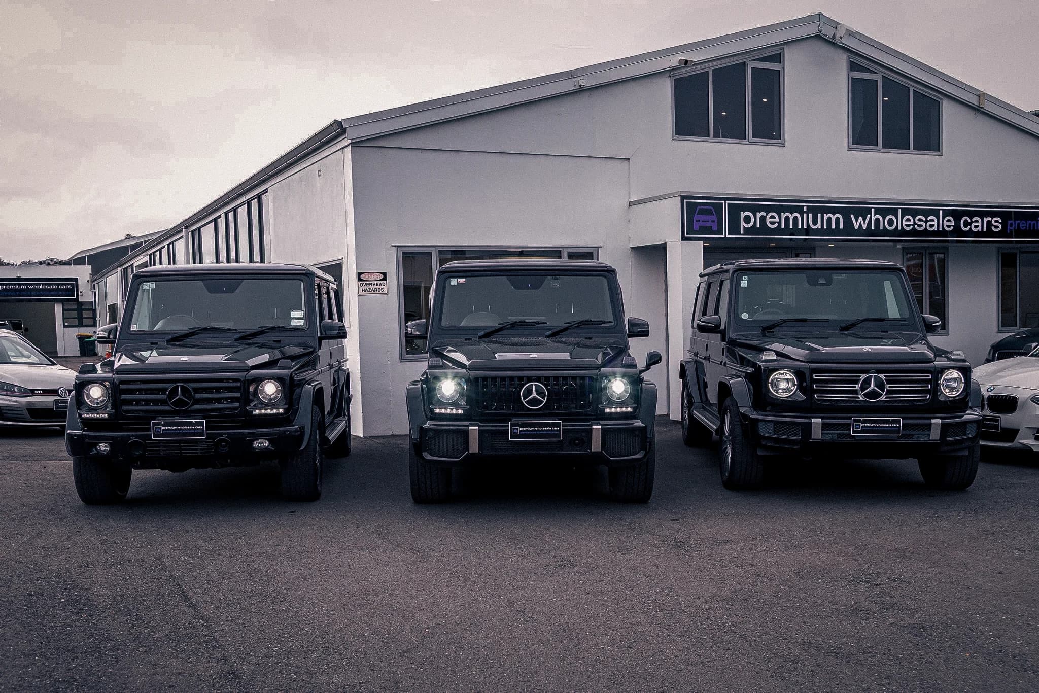 Paul Gray and Lucas with a Mercedes-Benz G-Wagon outside the Premium Wholesale Cars yard at 27 Watts Road, Sockburn
